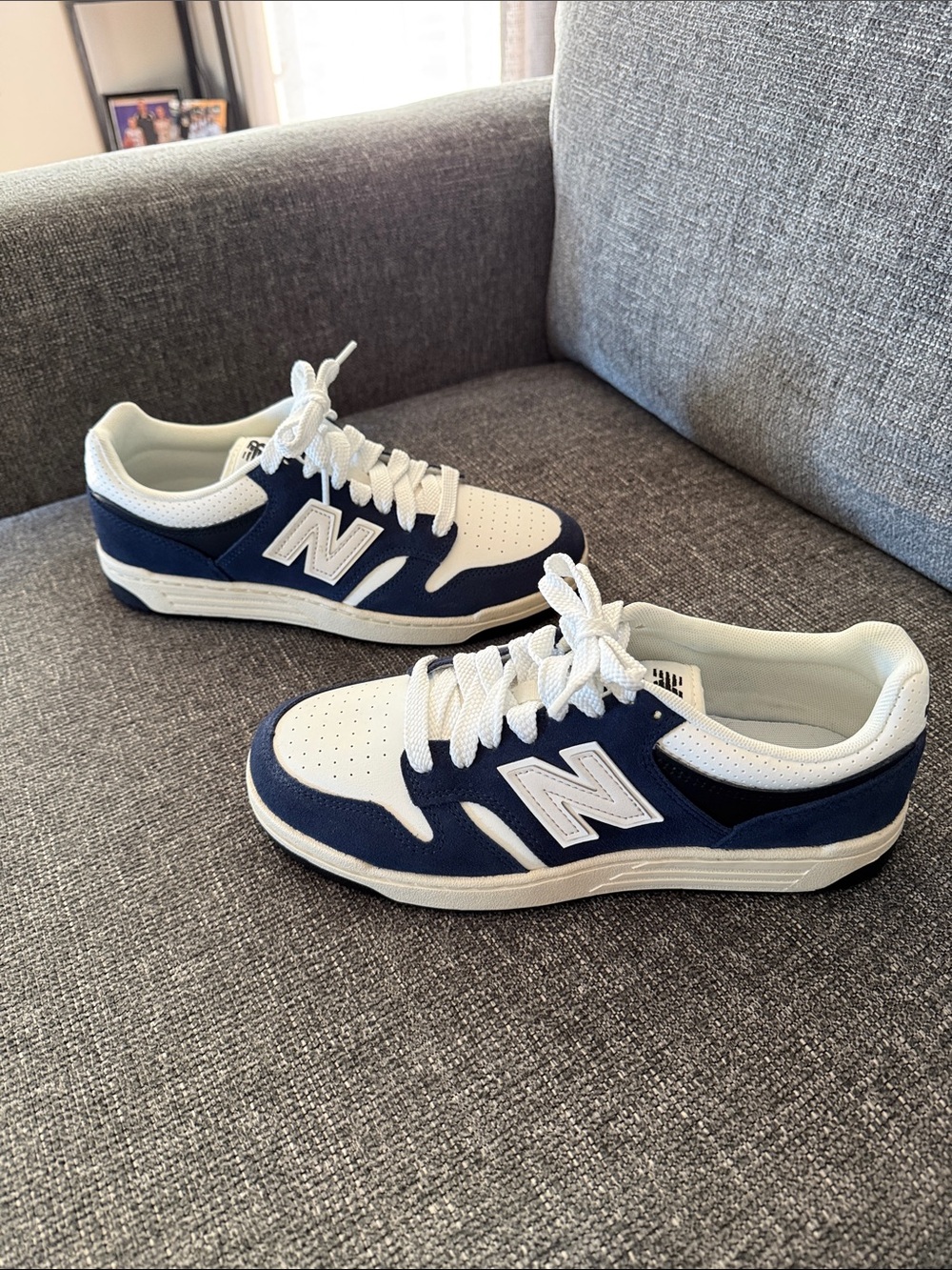 New Balance Navy and White Low-Top sneakers .. Women’s Size 9 1/2  or Men’s 8